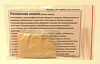 Масло каменное  неочищенное.
