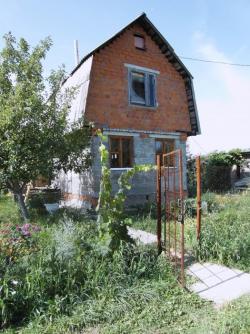 Продам участок земли,дом